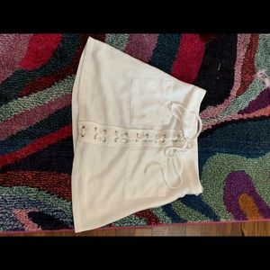 White lace up miniskirt with pockets